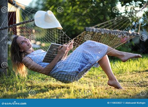 Beautiful Young Girl Lying and Reading a Book Stock Image - Image of lying, girl: 110833827