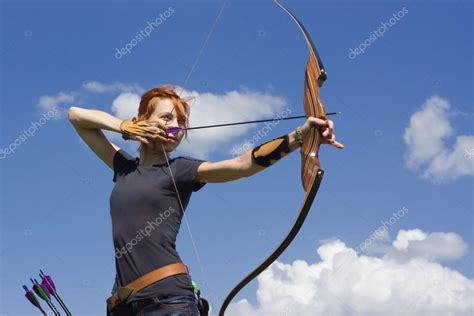 Archery woman bends bow archer target narrow — Stock Photo © Demian ...