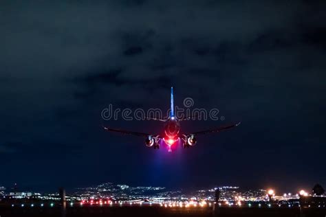 Jet Plane Landing Scene in the Night Stock Photo - Image of airliner, arrival: 139643194