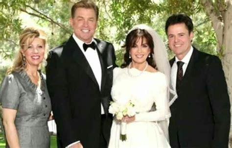 Marie Osmond"s second wedding to Steven Craig, with Donny and his wife Debbie on either side of ...