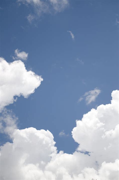 Blue Sky With Clouds - Photography Art Print by Kevin O'Gara | Kevin Francis Design