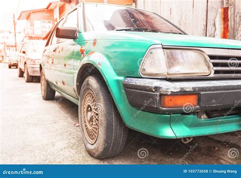 Heavily Worn Green Peeled Rusty Old Car. Stock Photo - Image of chair, barrier: 103772658