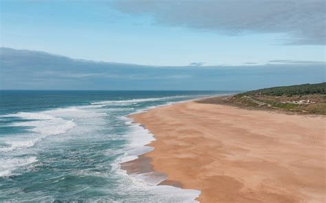 brown sand beach during daytime photo – Free Water Image on Unsplash