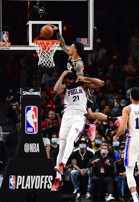 John Collins trolls 76ers' Joel Embiid with shirt of dunk