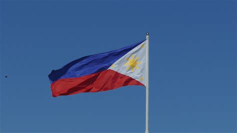 Philippine flag waving in the sky - Free Stock Video - Mixkit