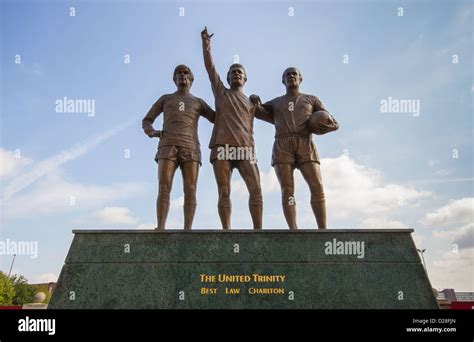 The United Trinity. Statue outside Old Trafford football stadium of ...