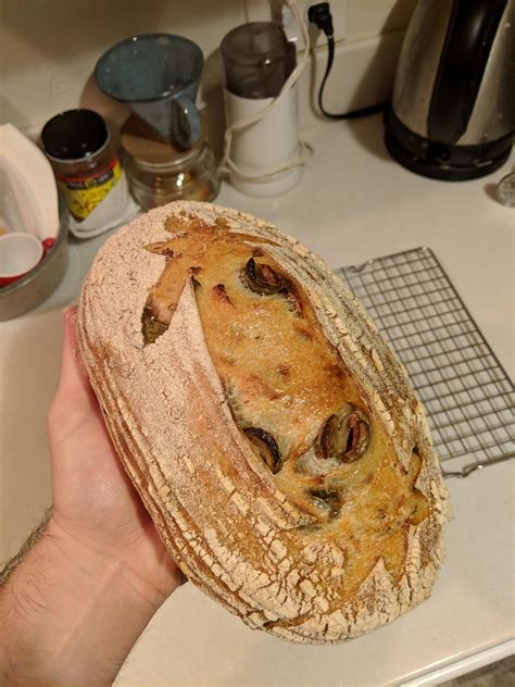 Olive loaf! Recipe from Tartine. Heven't cut it open yet but im pleased with the results so far ...