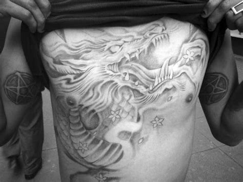 Dragon on Chest Tattoo | Tattoos, Chest tattoo, Picture tattoos