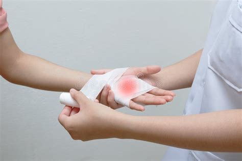 Nurse Applying Bandage To Patient Stock Photo - Image of assistance, gloves: 71012290