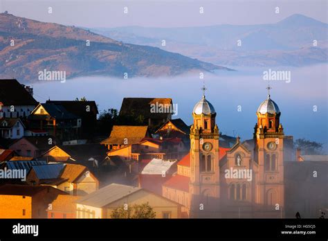 Early morning mist on the Haute Ville old town, Ambozontany Cathedral, Fianarantsoa, central ...