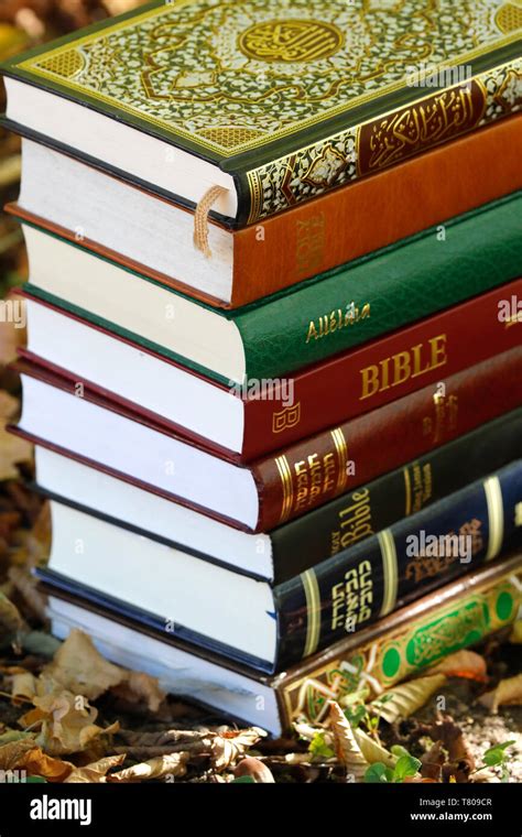 Bible quran christianity islam hi-res stock photography and images - Alamy