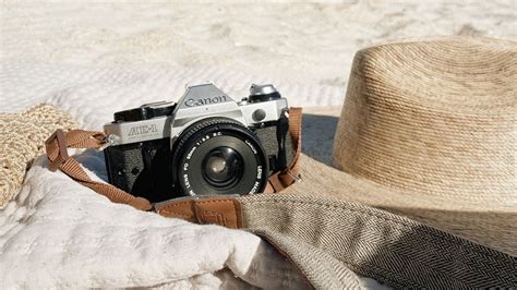 Download wallpaper 1920x1080 camera, lens, hat, beach full hd, hdtv, fhd, 1080p hd background