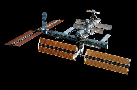 Iss With New Solar Panels Photograph by Nasa/science Photo Library - Pixels