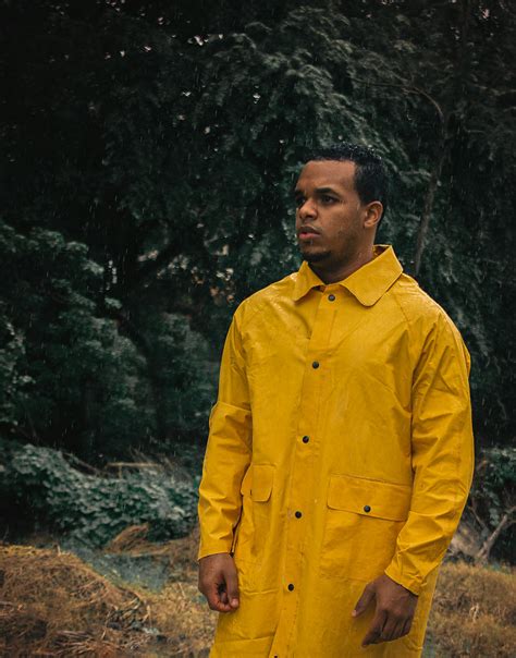 Man in Yellow Dress Shirt Standing Near Green Trees · Free Stock Photo