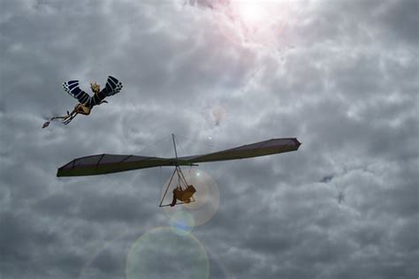 Hang glider n dragon with lens flare | Robin Hutton | Flickr