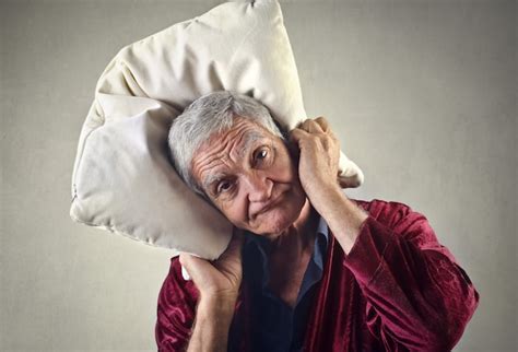 Premium Photo | Tired old man with a pillow