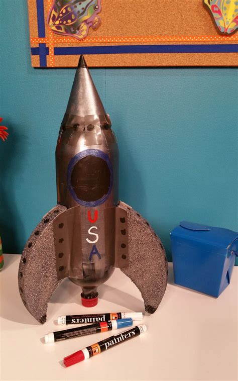 up-cycled soda bottle rocket ship. #handsoncraftsforkids #series900 #kidscrafts #makeitfuncrafts ...