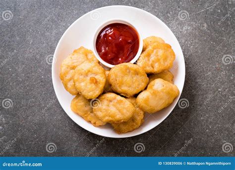 Chicken nuggets with sauce stock photo. Image of crispy - 130839006