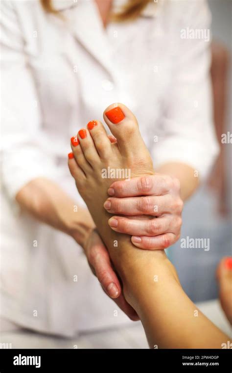 Foot massage hi-res stock photography and images - Alamy