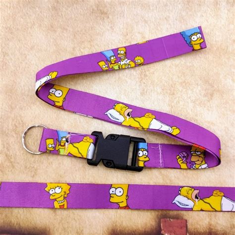 Cordão OS SIMPSONS ROXO Tirante para Pescoço com Engate Rápido e Argola prente Crachá Chupeta ...