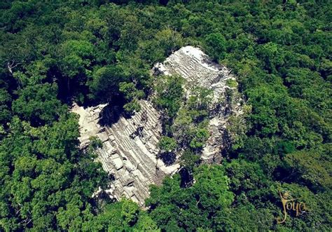 an aerial view of trees and rock formations in the middle of a forest ...