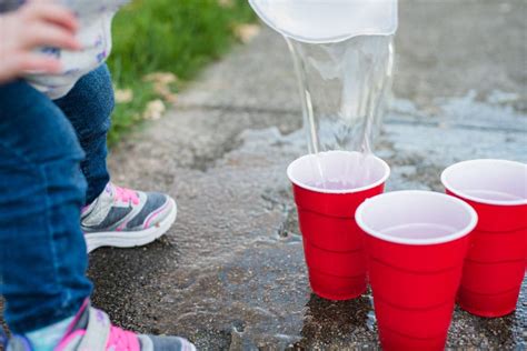 Water Pouring Activity for Toddlers to Improve Hand-Eye Coordination