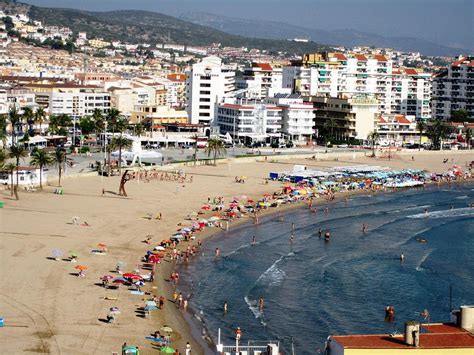 Peniscola Beach Sea View Waterfront Swimmers At the Mediterranean in Spain Photograph by John ...