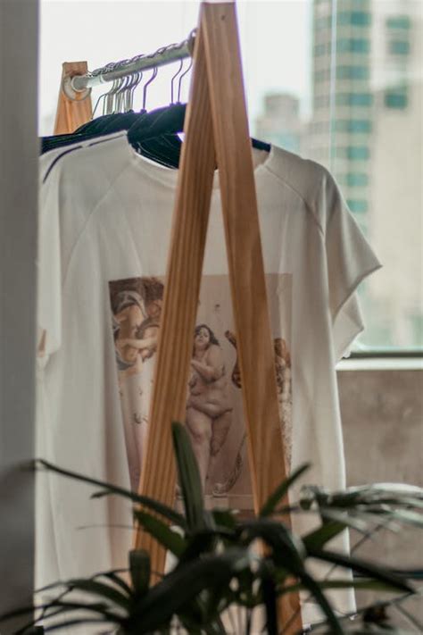 Pile of Shirts Hanged in Shirt Rack · Free Stock Photo