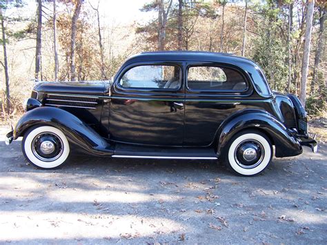 Antique 1936 Ford Tudor Touring Sedan 36