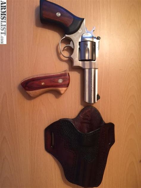 ARMSLIST - For Sale: Stainless Ruger GP100 + accessories