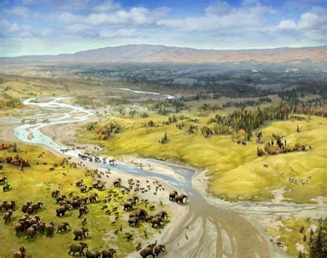 A Pleistocene view (approx. 10,000 years ago) of mammoths wandering the landscape that is now ...