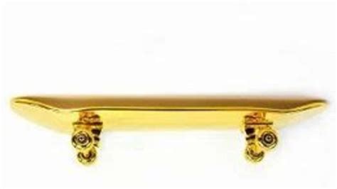 Queen Elizabeth is selling her gold-plated skateboard | The Spoof