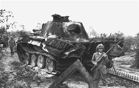 Americans Soldiers Guarding a Destroyed Panther Tank During Operation Cobra, July 1944. : r/TankPorn