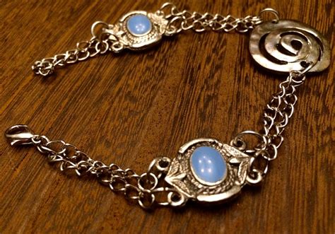 Silver & Blue Charm Bracelet | Blue charm, Charm bracelet, Bracelets