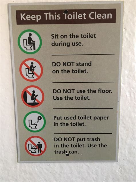 This bathroom sign reminds you to not use the floor or stand on the toilet : r/mildlyinteresting