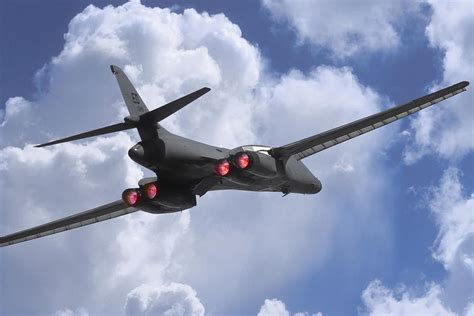 B-1B Lancer Takeoff in Afterburner Photograph by Erik Simonsen - Pixels