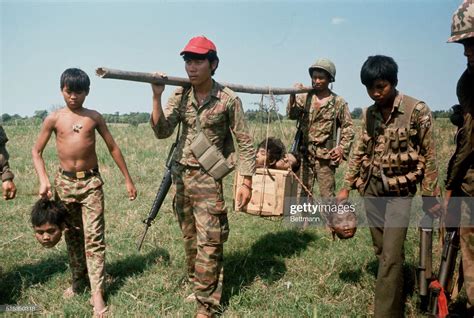 Anti-Khmer Rouge child soldiers and their trophies of Khmer Rouges heads, Cambodian civil war ...