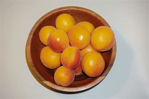 Apricot Harvest Wooden Bowl's Sunlit Treasures by Raju C R… | Flickr