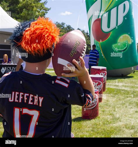 July 29, 2017: Bourbonnais, Illinois, U.S. - A young fan plays a game ...