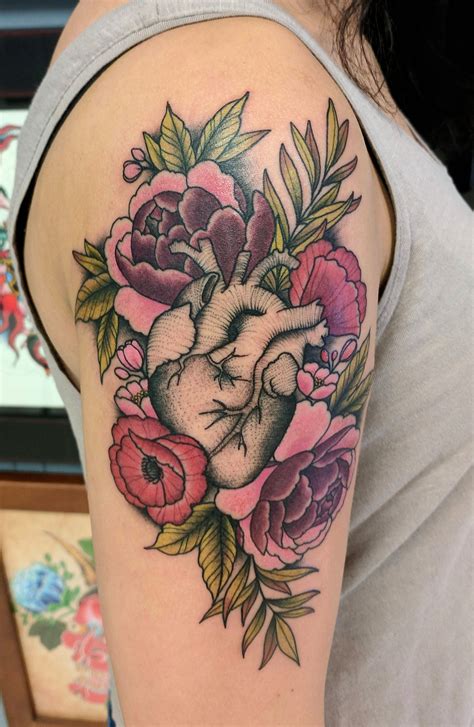 Anatomical heart and flowers tattoo done by Shane Olds at Rise Above in Orlando, FL | Anatomical ...