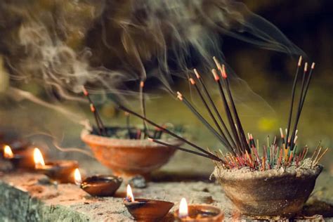 Stick incenses burning in a ceramic bowl | Incense, Incense sticks ...