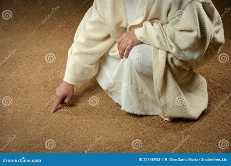 Jesus Writing In The Sand Stock Photos - Image: 27448953