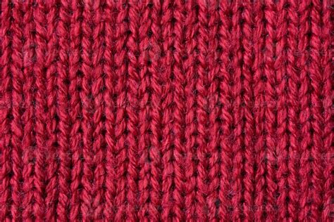 Red knitted wool texture background 12971283 Stock Photo at Vecteezy