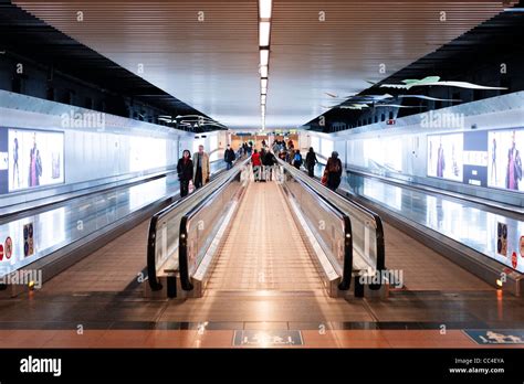 Moving walkway in Brussels airport Stock Photo - Alamy