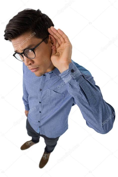 Businessman cupping ears — Stock Photo © Wavebreakmedia #160662694