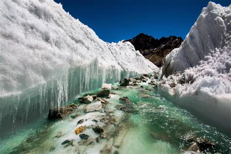 Himalayas - India. Glacial melt water carving the ice.[3000x2000] photo by Sharada Prasad ...