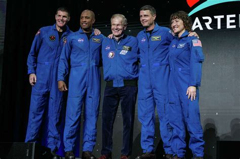 NASA names four astronauts who will circle the moon on Artemis II