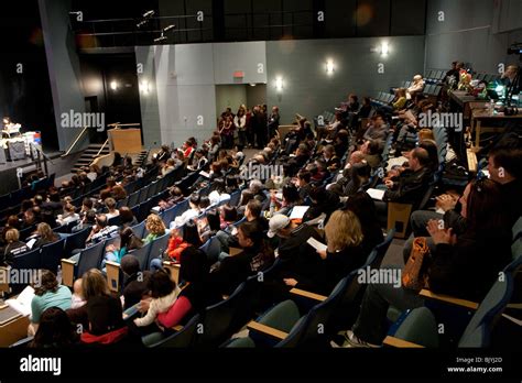 crowd crowded people room full fill stage cinema theater concert hall Stock Photo - Alamy