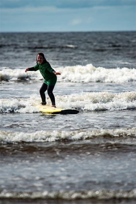 Young Little Girl on Beach Taking Surfing Lessons Stock Image - Image of focus, child: 99971879