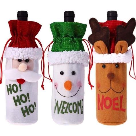 three christmas wine bottles with santa hats and reindeer noses